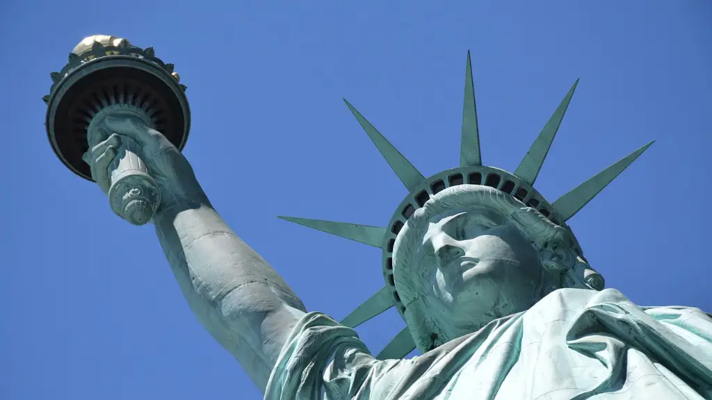 what does her torch on the statue of liberty represent